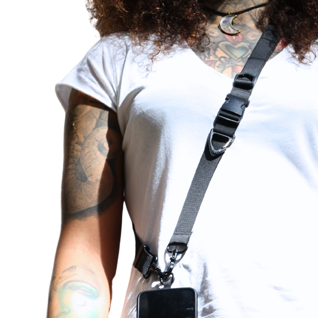 Close-up on the front. Wearing 2-in-1 Utility Lanyard Crossbody phone strap black.